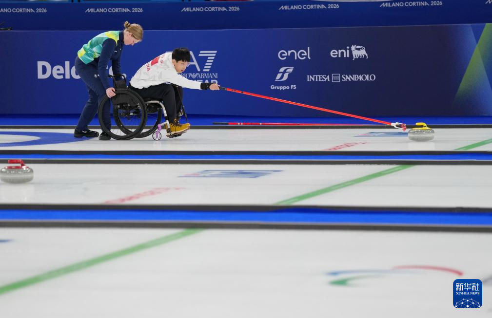 冬残奥会——轮椅冰壶混双循环赛：中国队胜意大利队